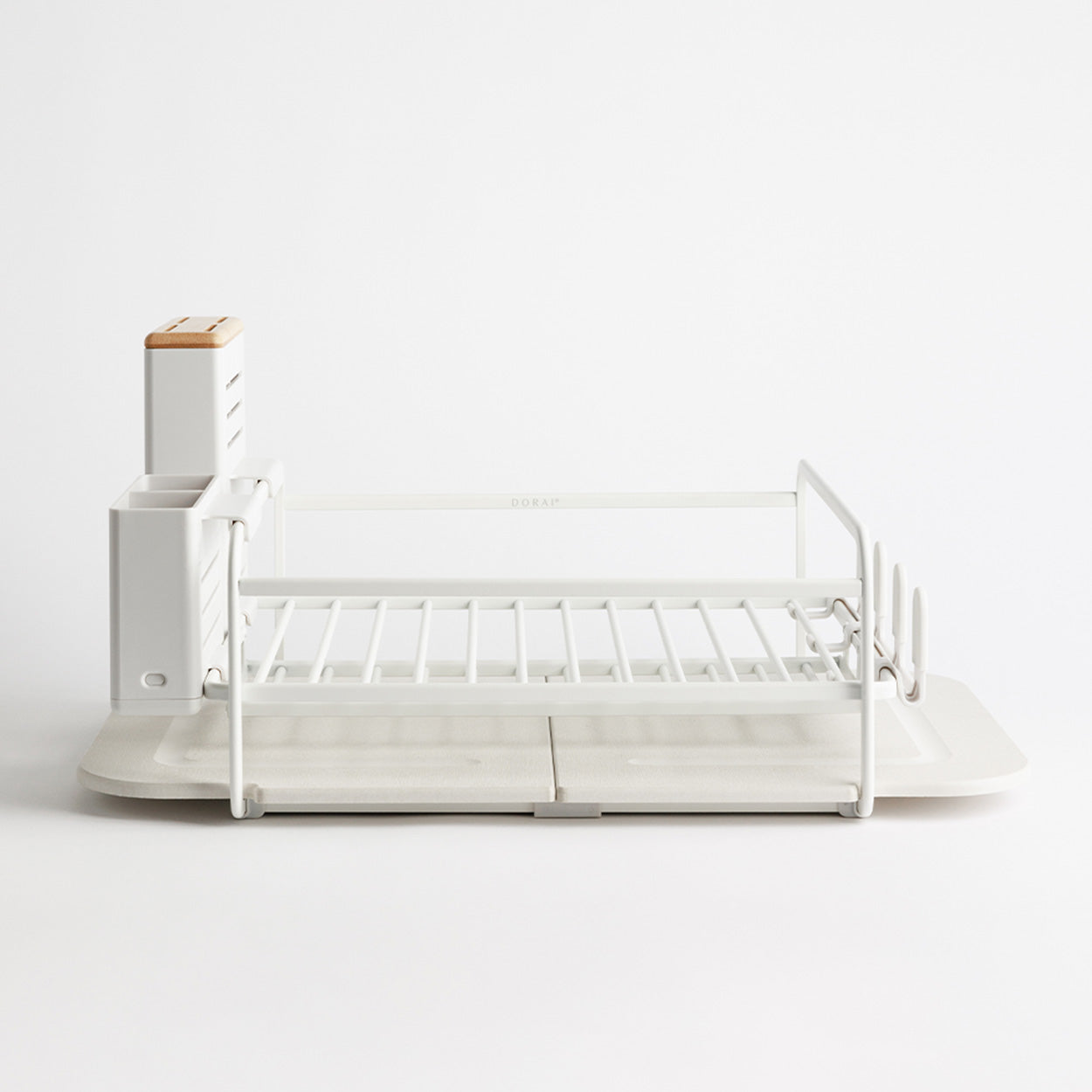 empty white dish rack with stone base