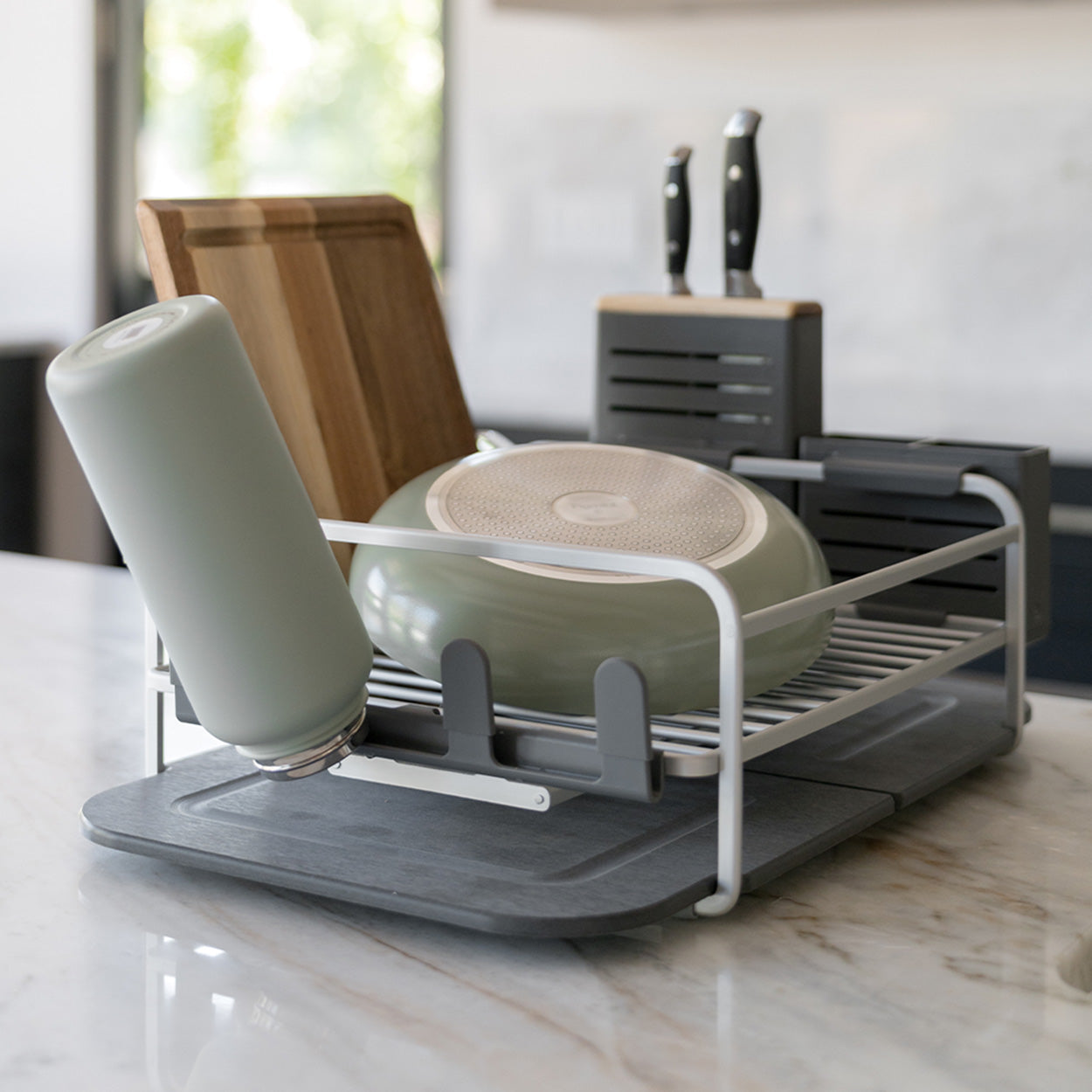 dish rack with heavy tumbler on glass holder