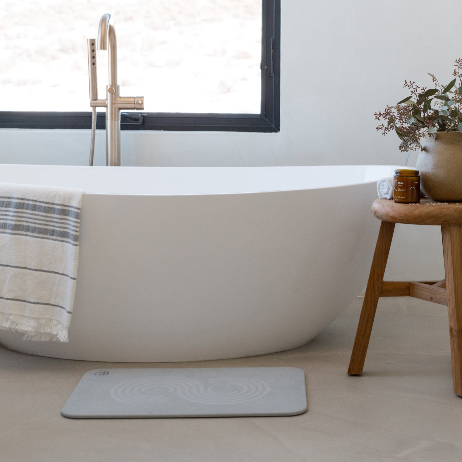 bath tub with stone bath stone in light grey