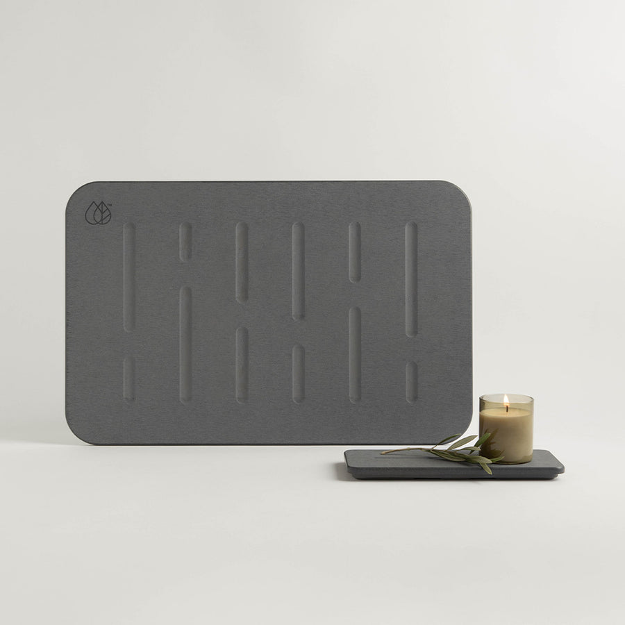 grey bath stone with stone sink caddy and candle