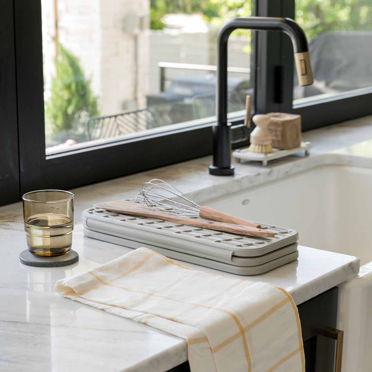 folded dish drying pad with utensils