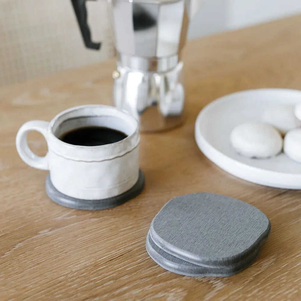 modern asymmetrical coasters in grey color