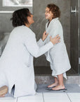 Slate Bath Stone™ with mother and child outside shower