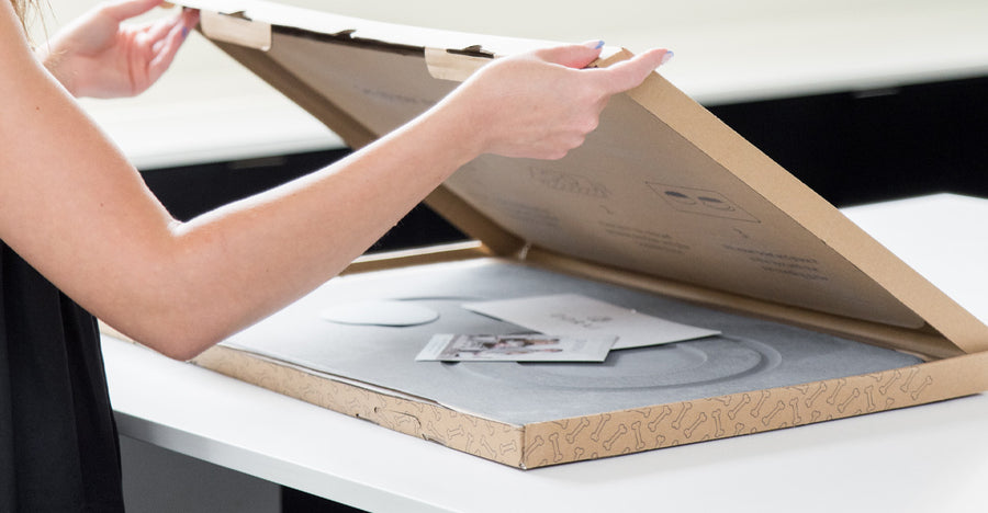 stone mat in box being unpackaged