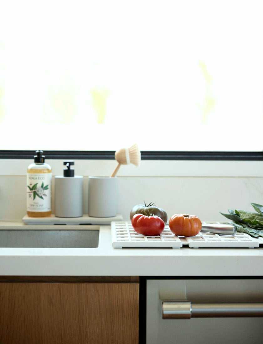 Beautiful Kitchen with Dish Pad and Stone Sink Caddy.