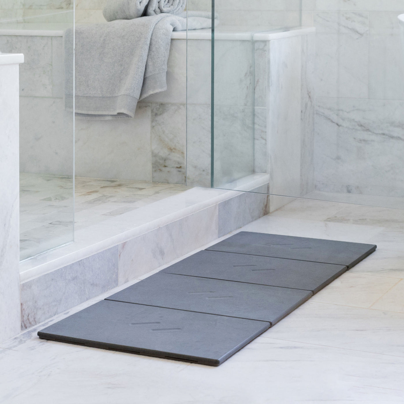 Large Alta Bath Stone in Slate stretched layout in modern bathroom.