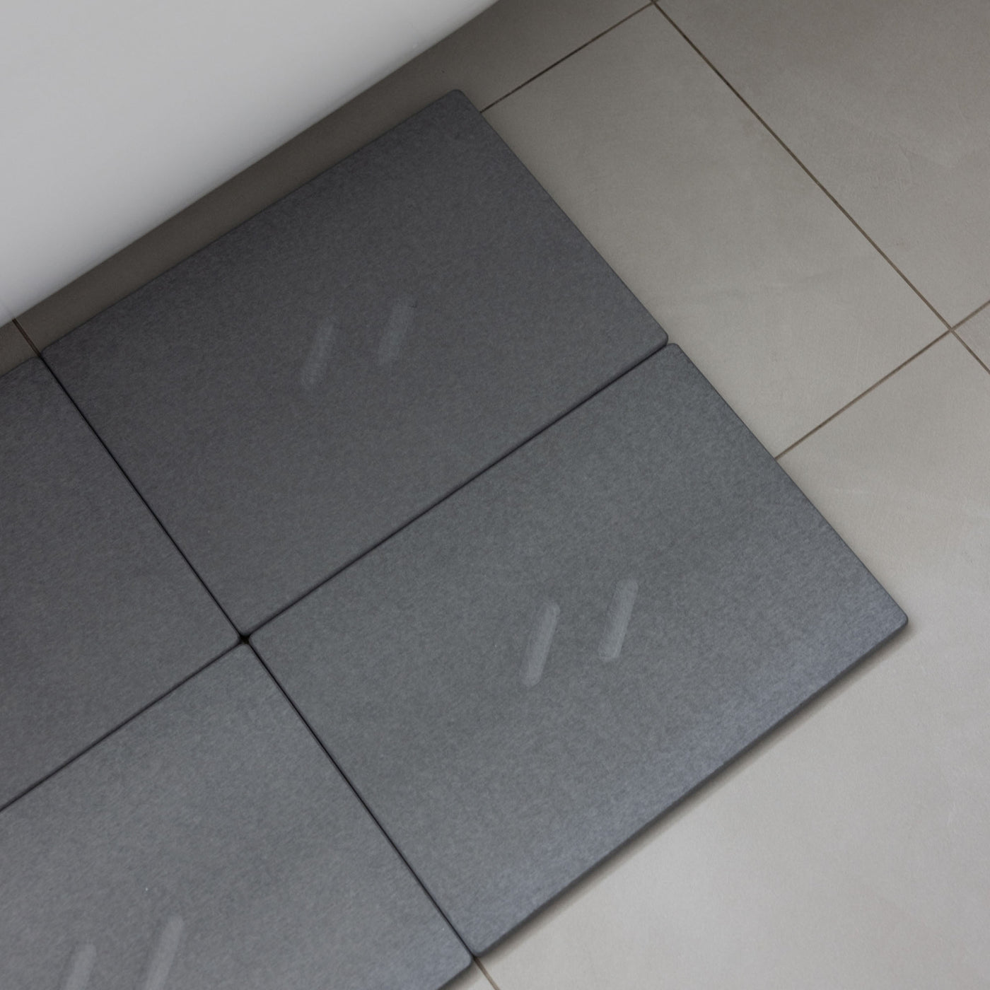Large Alta bath stone mat in Slate is quick-drying to keep your bathroom clean.