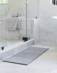 slate large bath stone mat in horizontal orientation next to shower