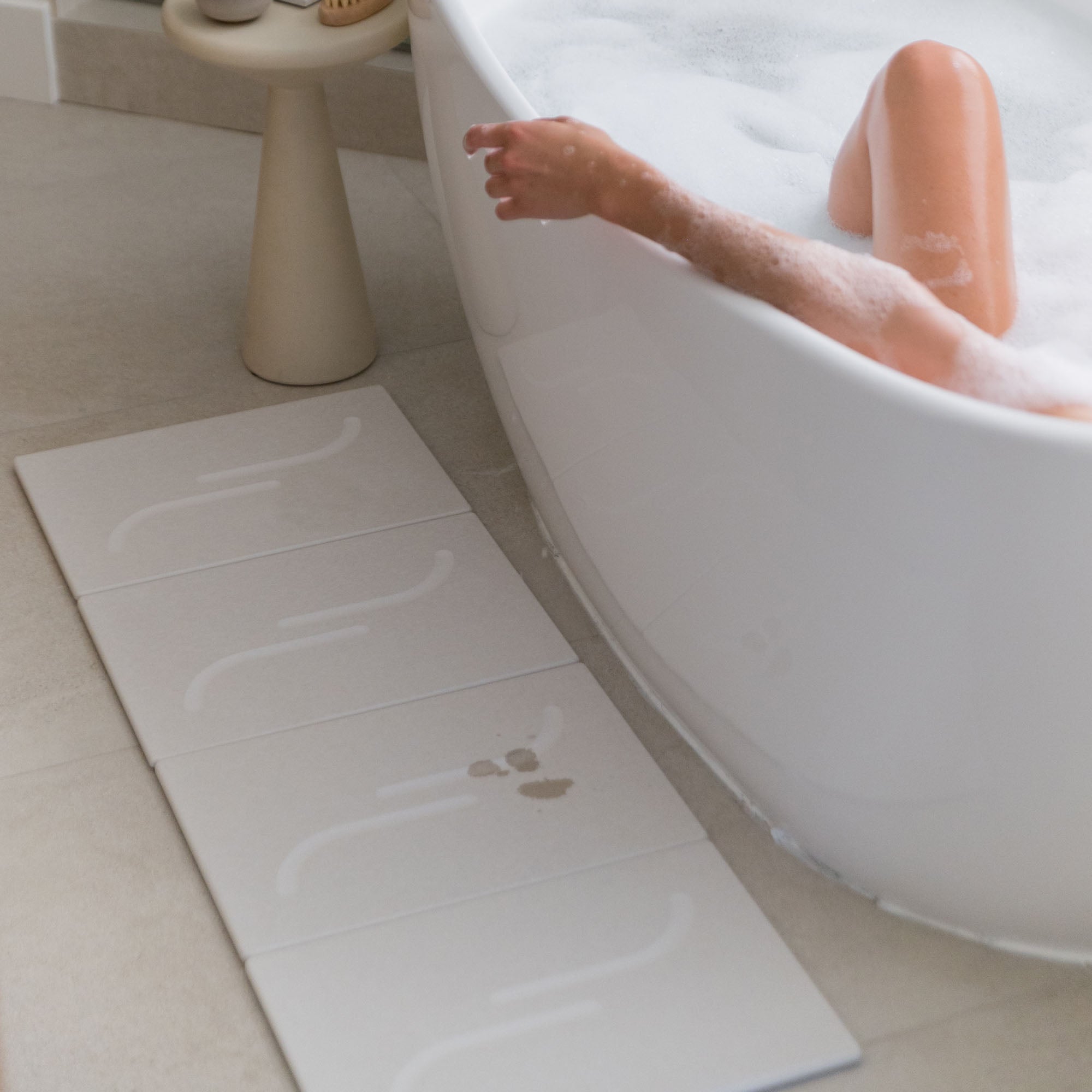 Large Arch Bath Stone in Sandstone stretched layout in modern bathroom.