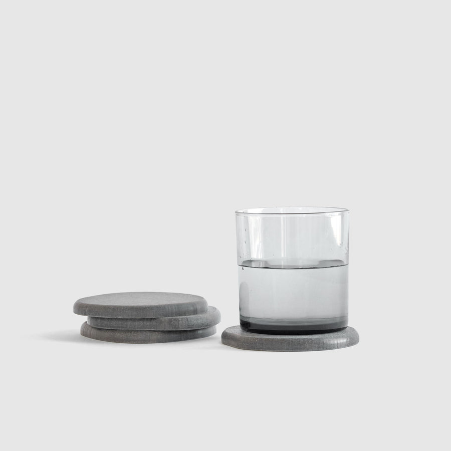 Slate Stone Coaster set stacked with drink.