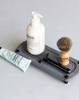 Slate Sink Caddy HERO with Soap and shaving items on top of it