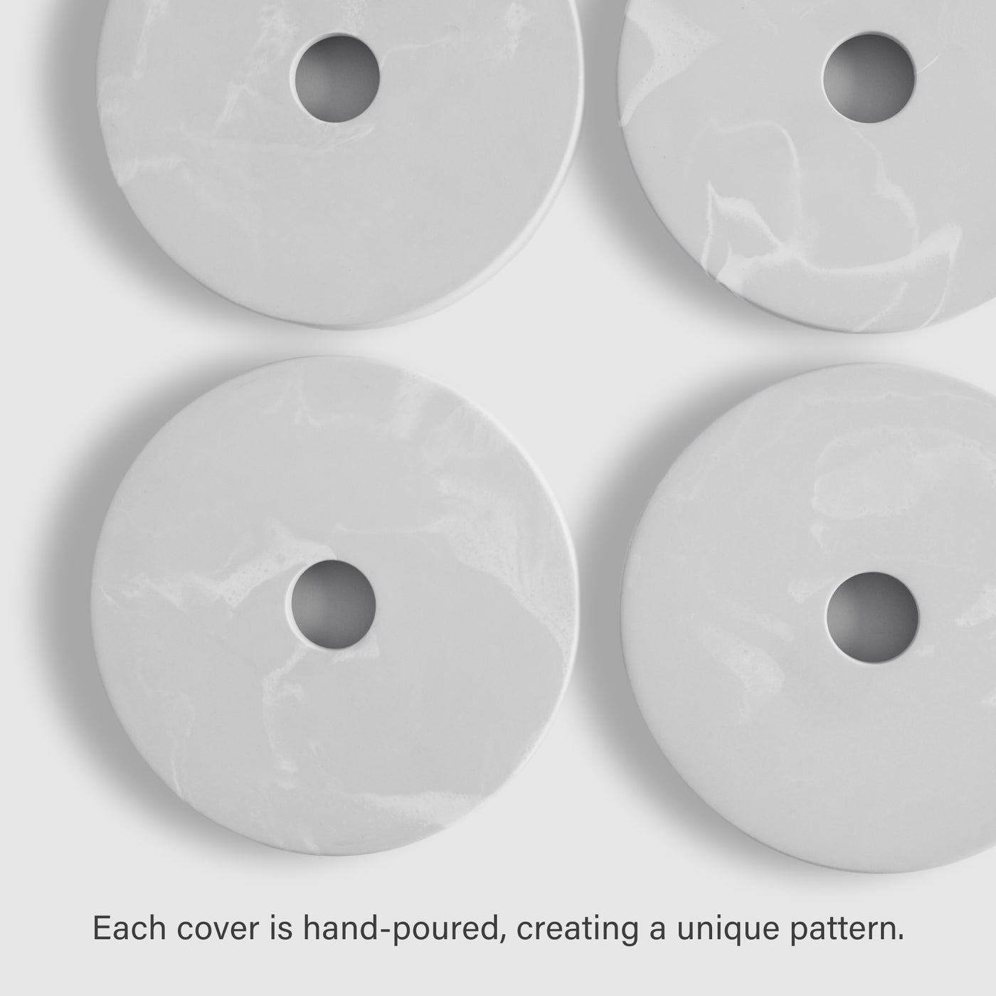 Four paper towel covers; hand poured, creating a unique pattern in glacier.