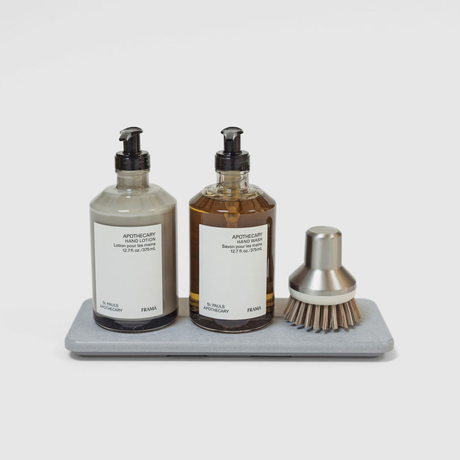 Ash Stone Sink Caddy with soap and scrub brush. | Ash Collection Image