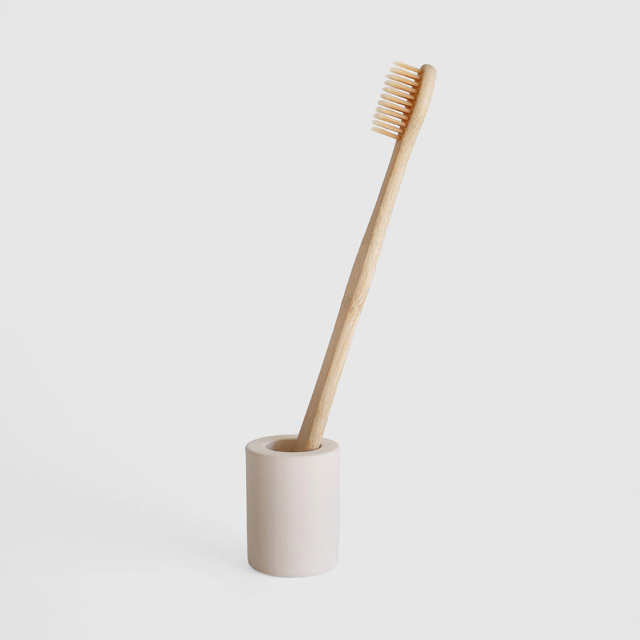 Soft Beige Small Toothbrush Holder on white background.