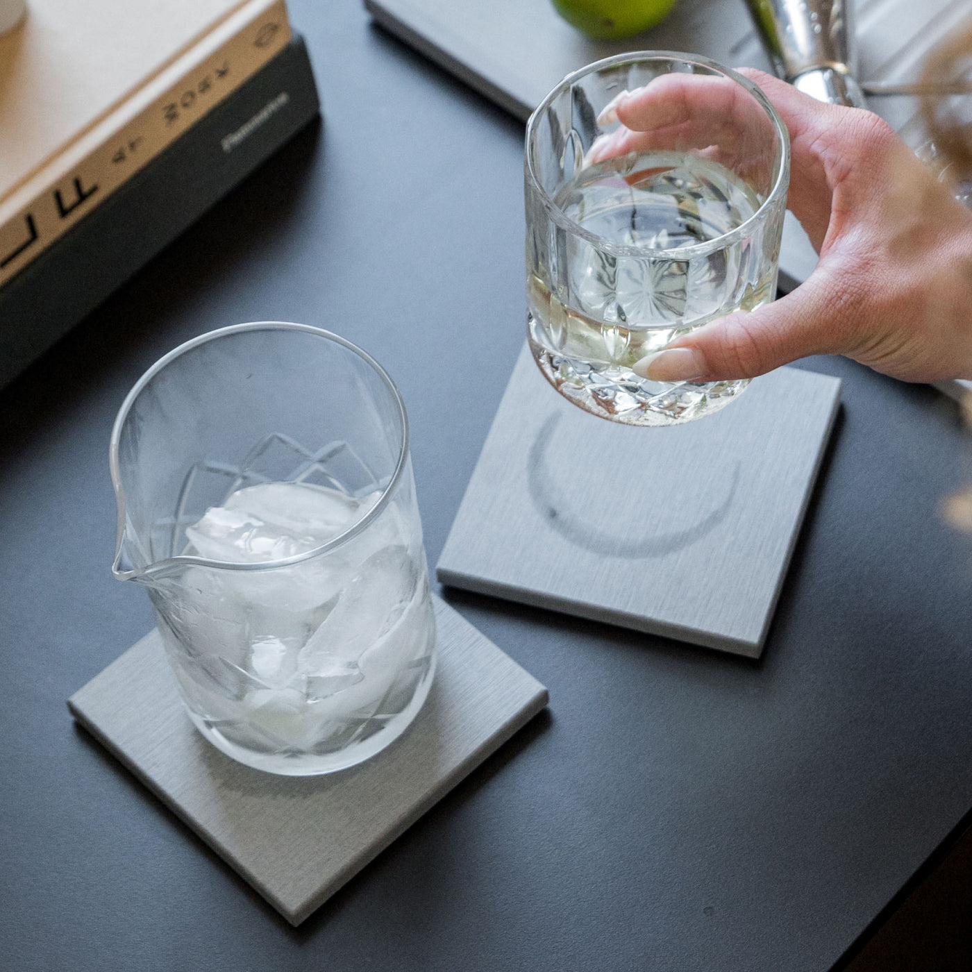 Large Ash Coasters with pitcher and cup protecting table from water rings. 
