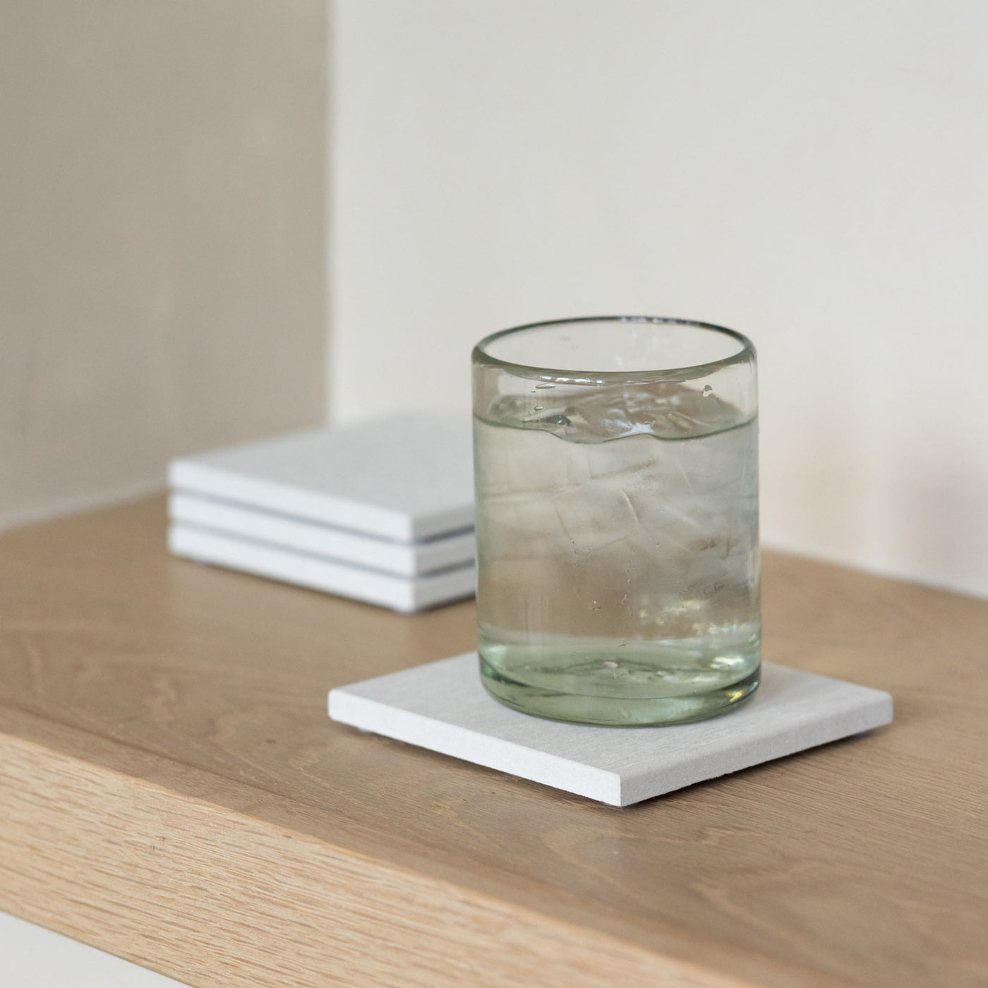 Large Sandstone Coaster with icy drink and table stays dry and protected. 
