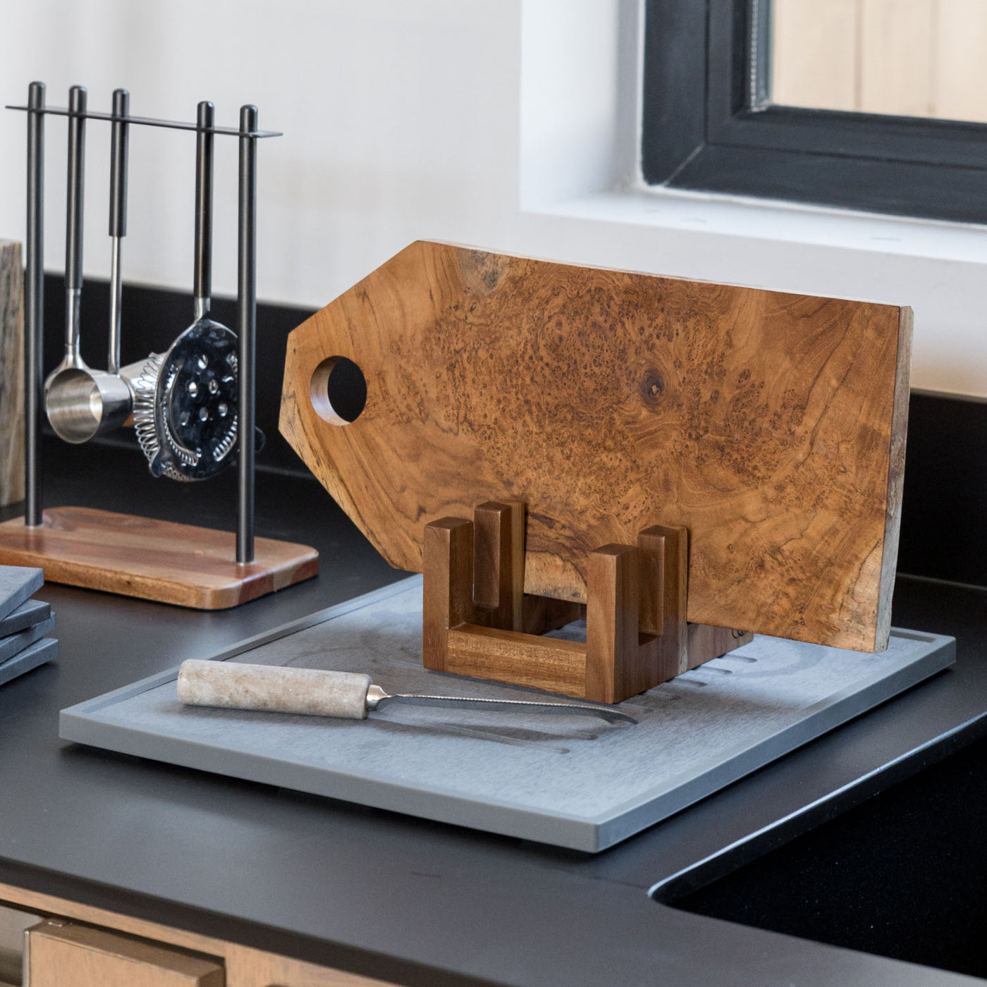 Acacia Cutting Board Holder on Dorai Dish Pad.