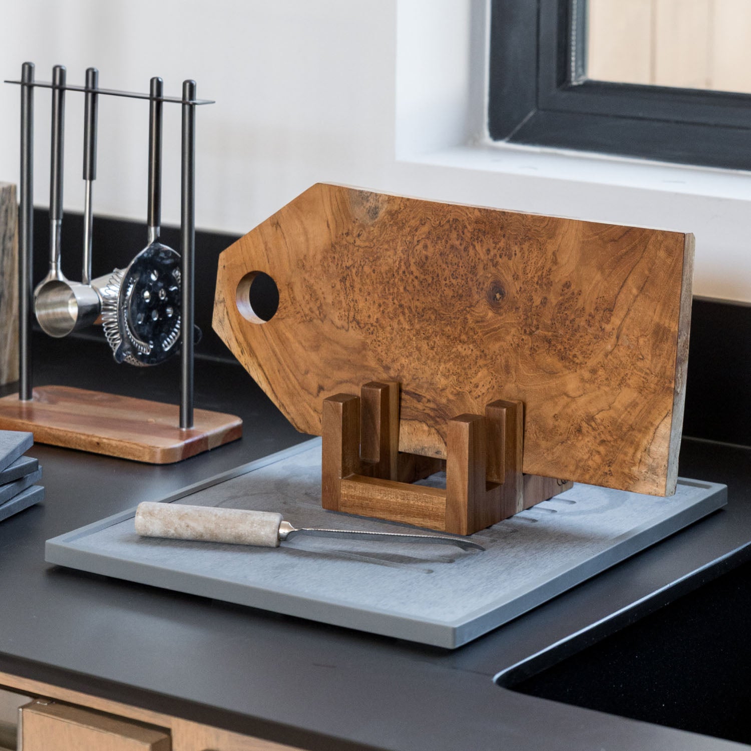 Acacia Cutting Board Holder on Dorai Dish Pad.