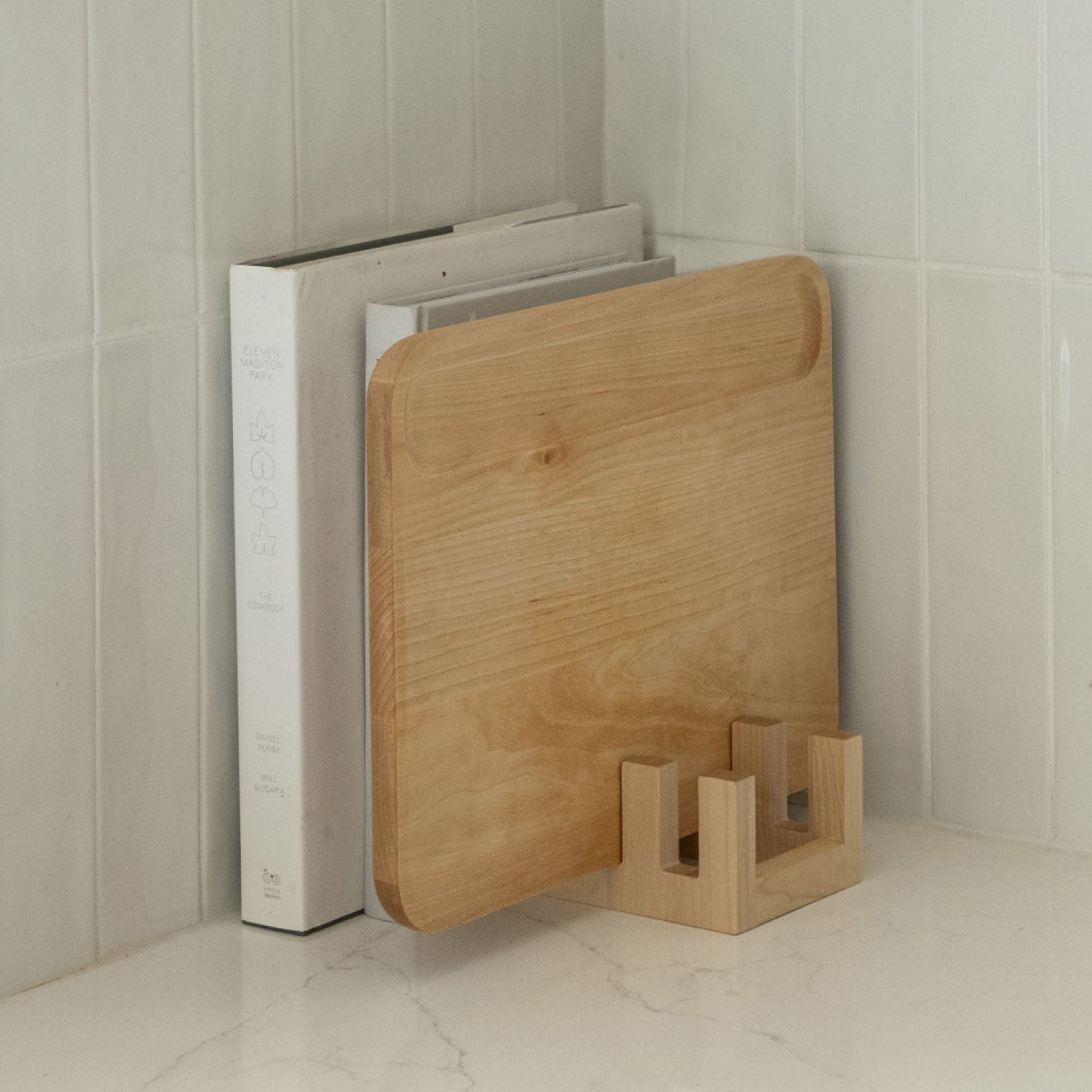 Maple Cutting Board holder stores beautifully with cookbooks.