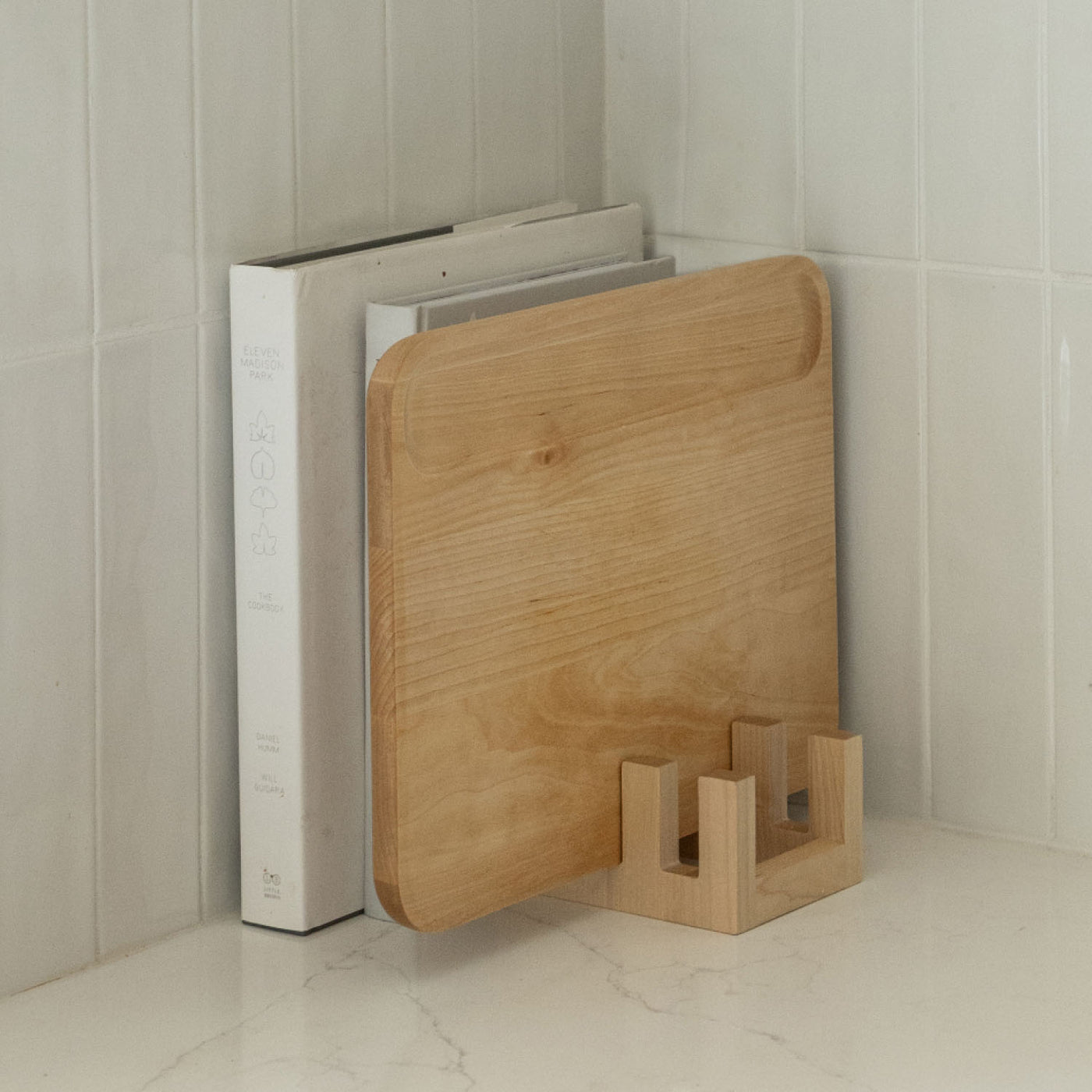 Maple Cutting Board holder stores beautifully with cookbooks. 