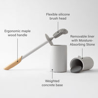 Gray silicone toilet brush cleaner with modern toilet brush holder. 