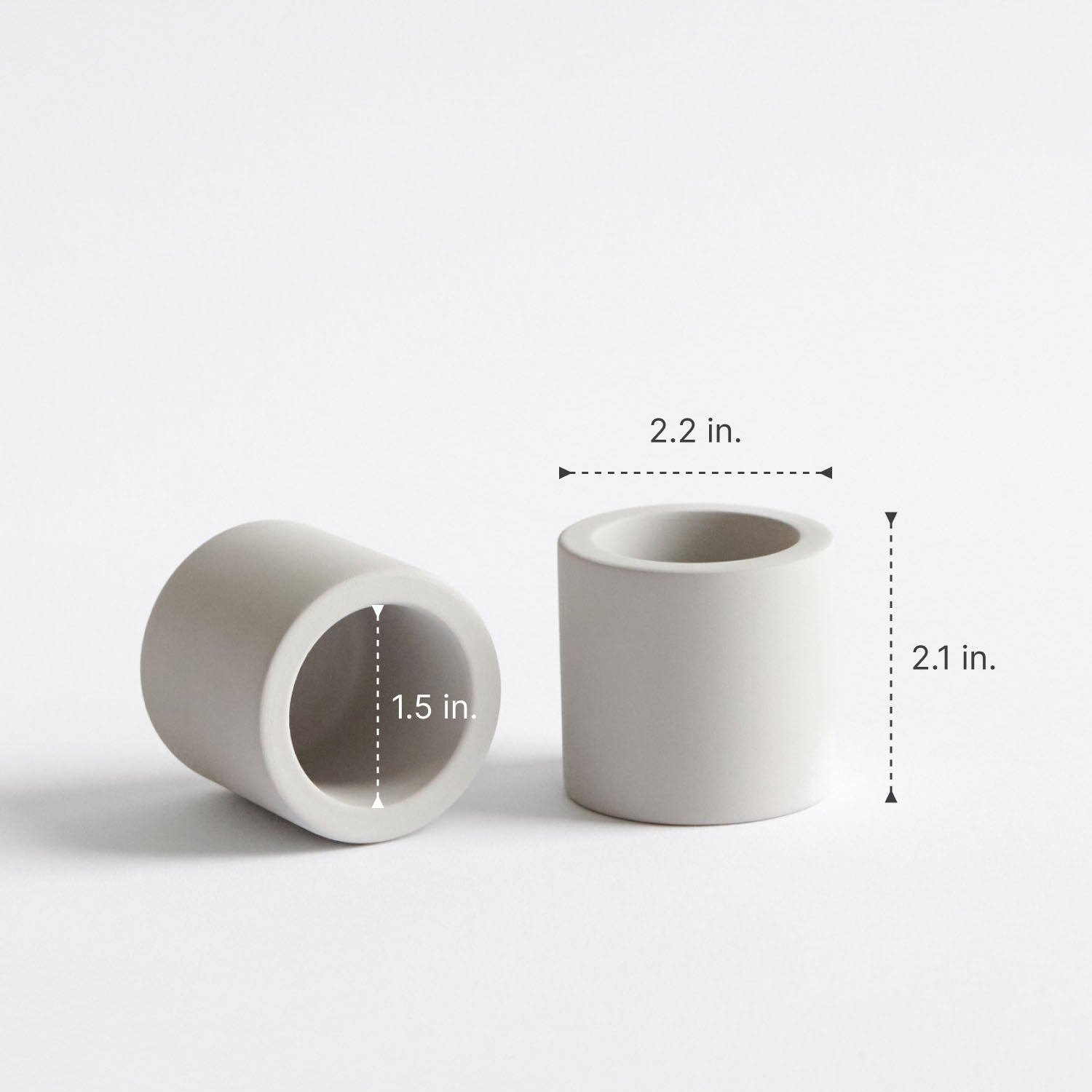 stone toothbrush holders with measurements on a white background