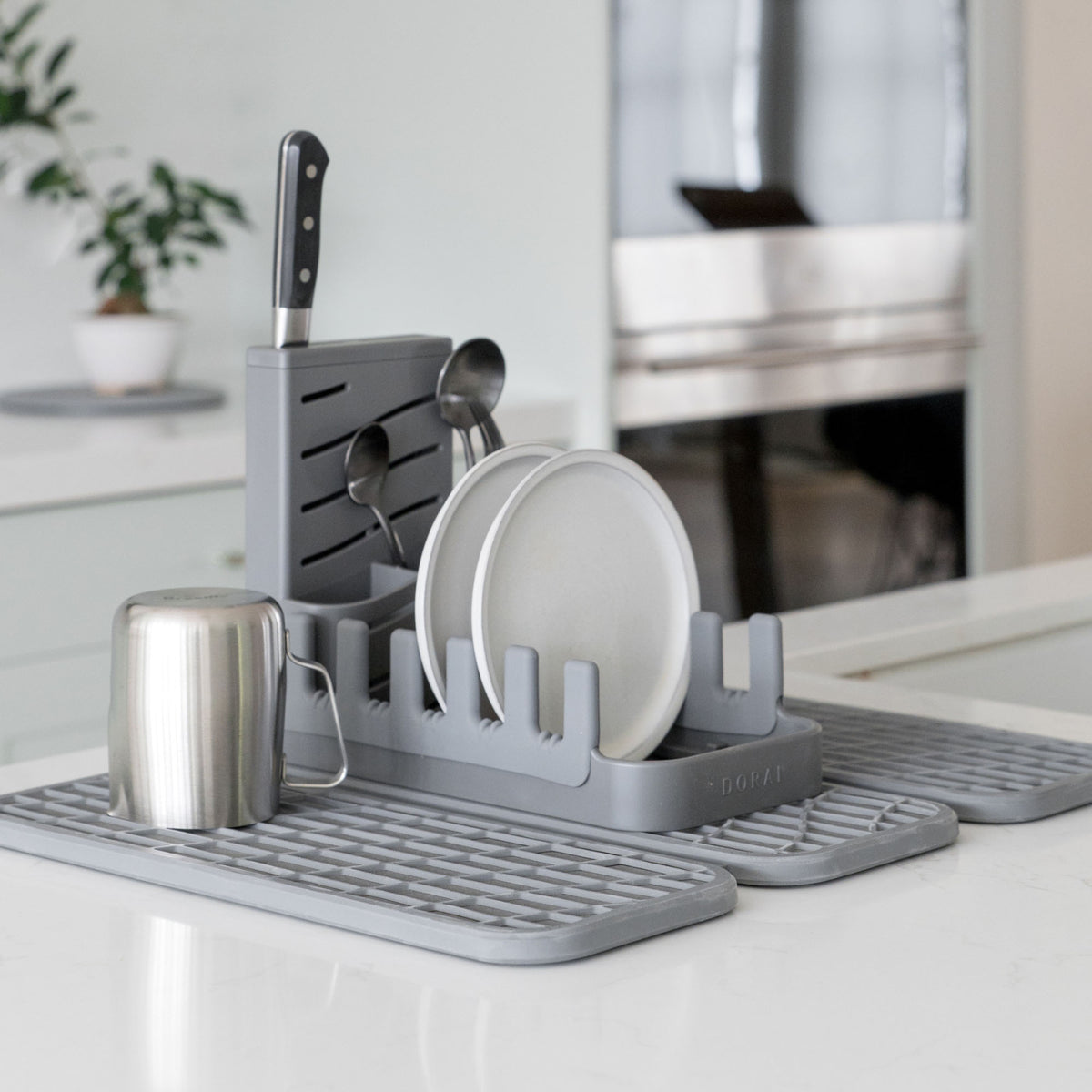 Slate Dish Pad with Slate Dish Pad Rack in clean kitchen with dry dishes. 