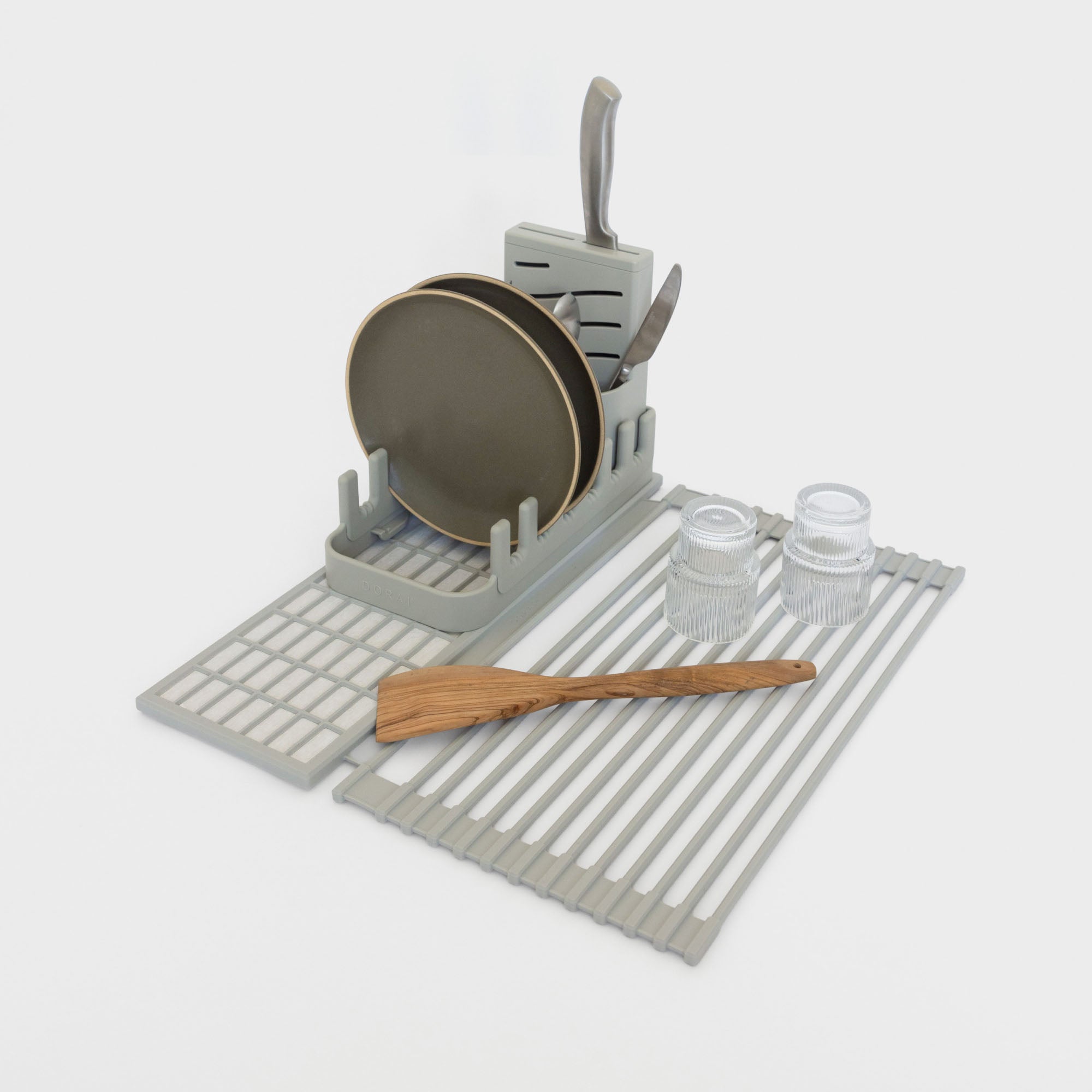 Sandstone Over the Sink Dish Pad with dishes on white background.