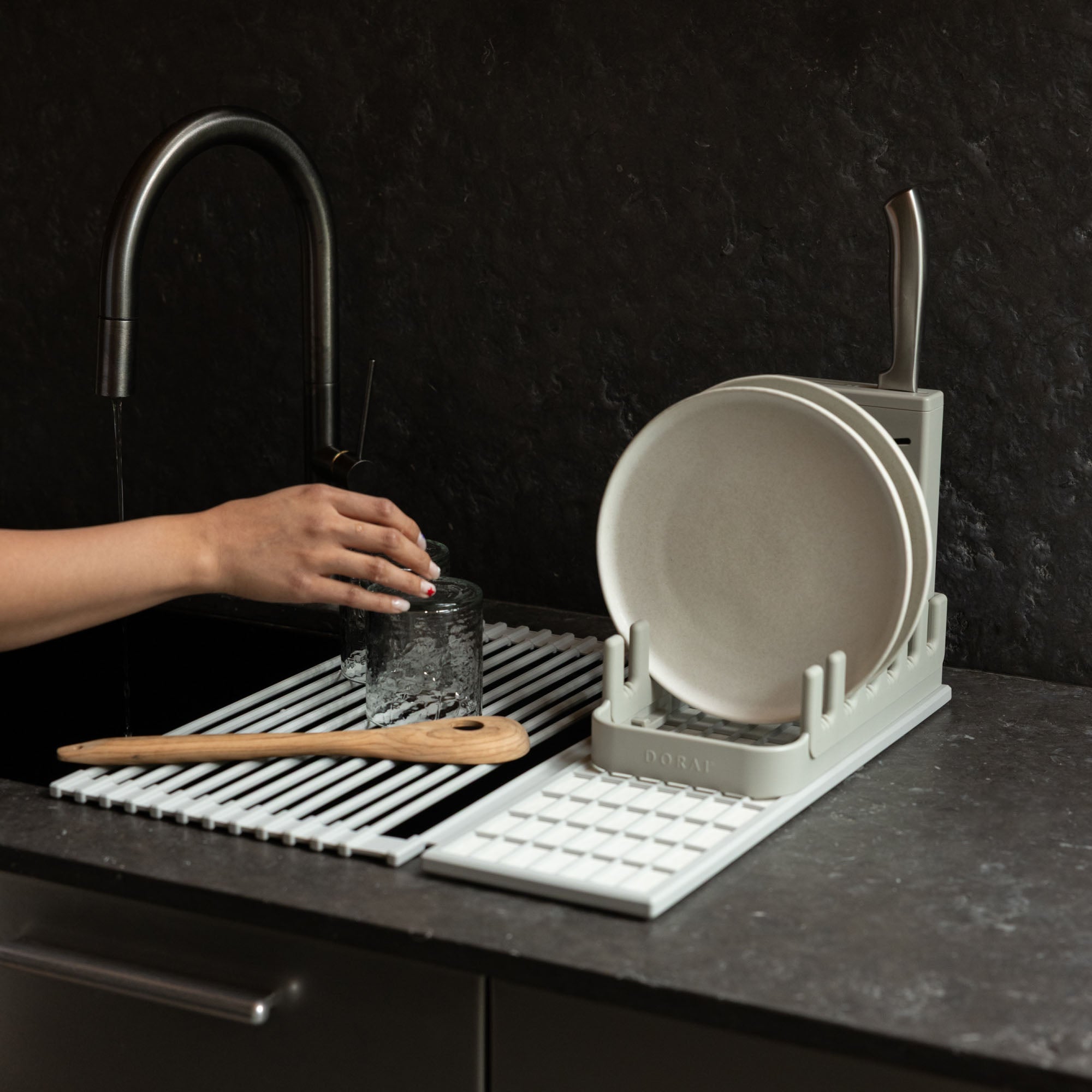 Sandstone Over the Sink Dish Pad with dishes over sink. 