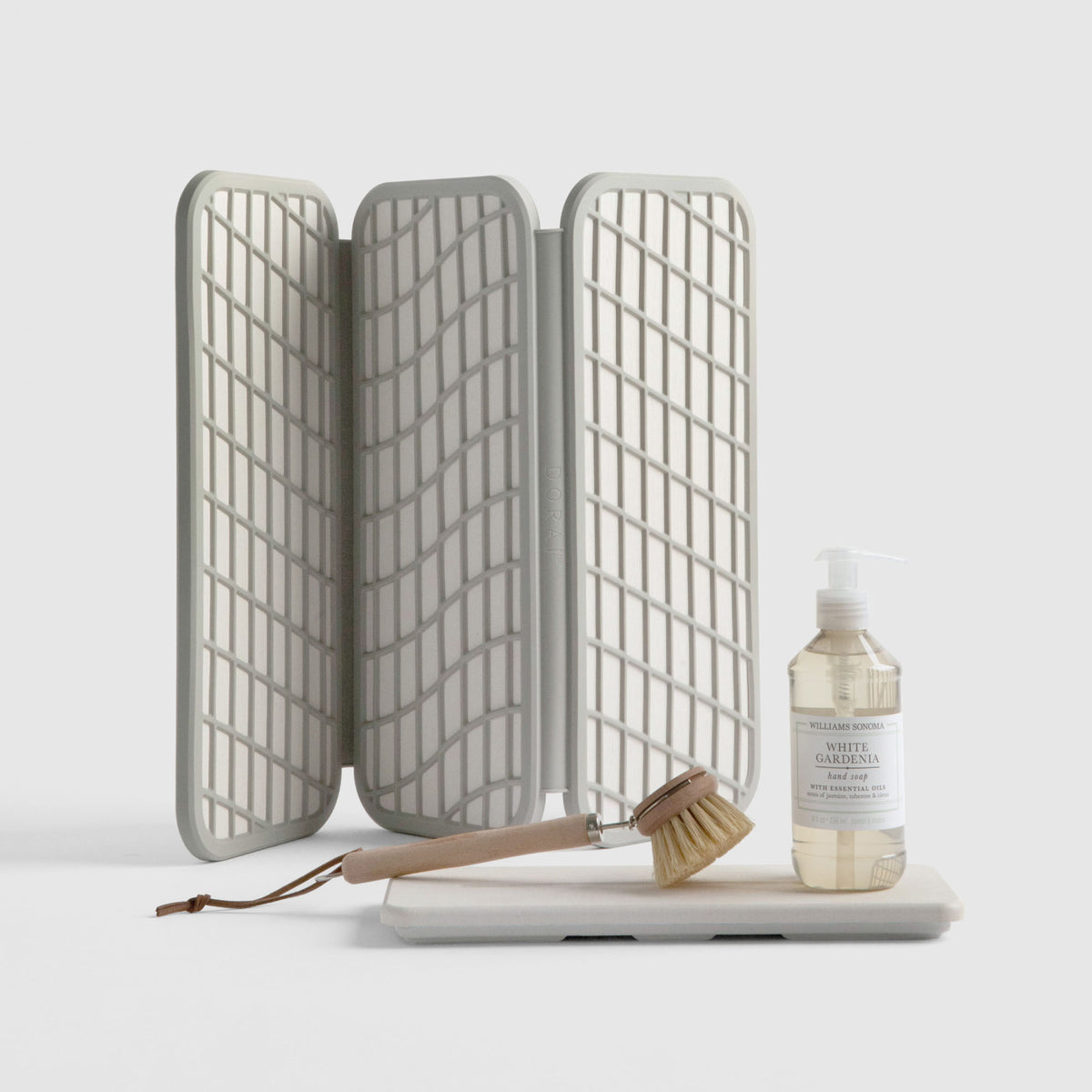 Sandstone Dish Pad with Stone Sink Caddy on white background. 