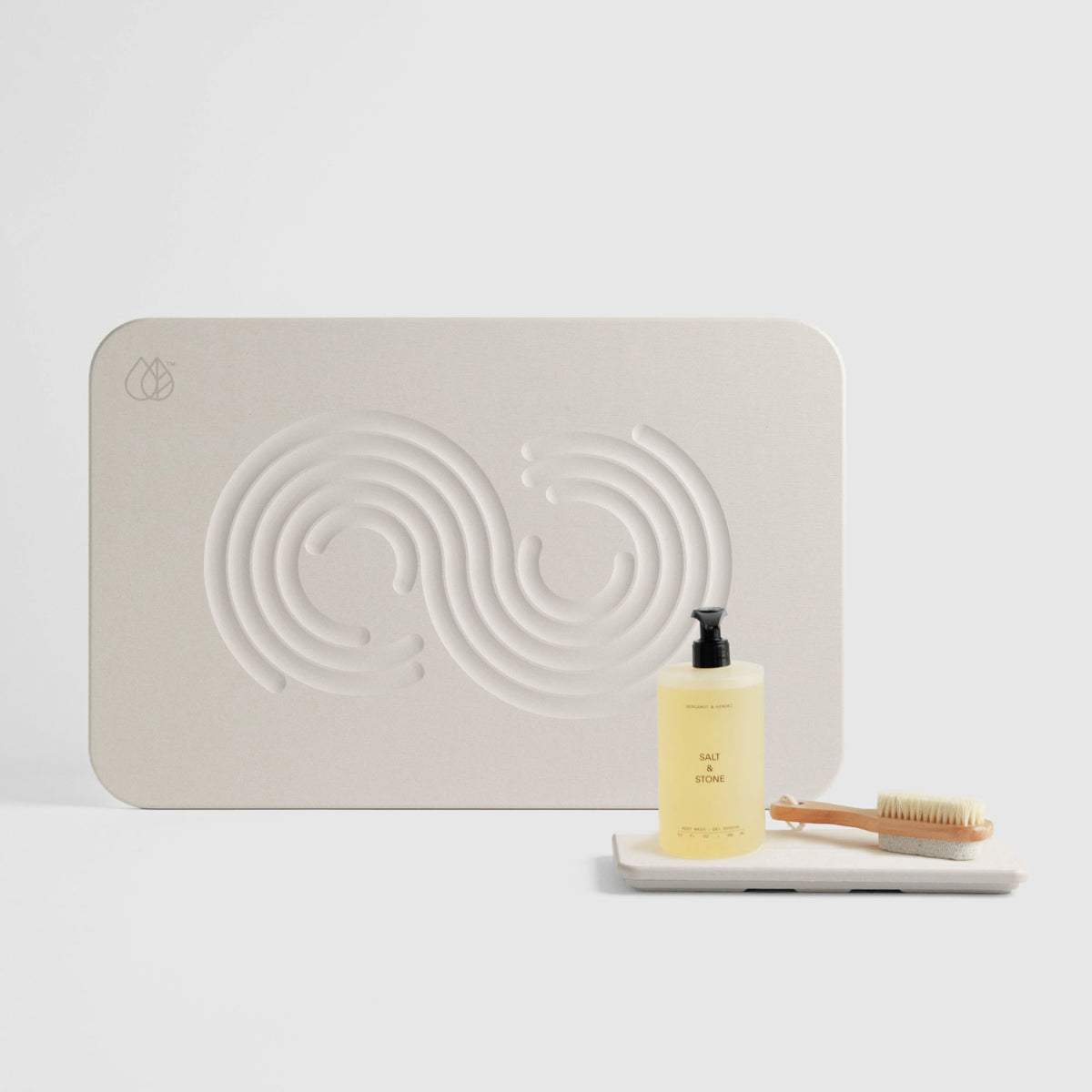 Sandstone Zen Bath Stone Mat and Sandstone Stone Sink Caddy on white background. 