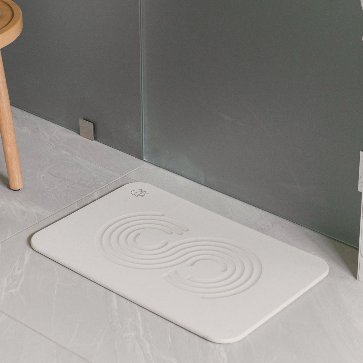 Sandstone stone shower mat quickly dries when you step out of the shower. 