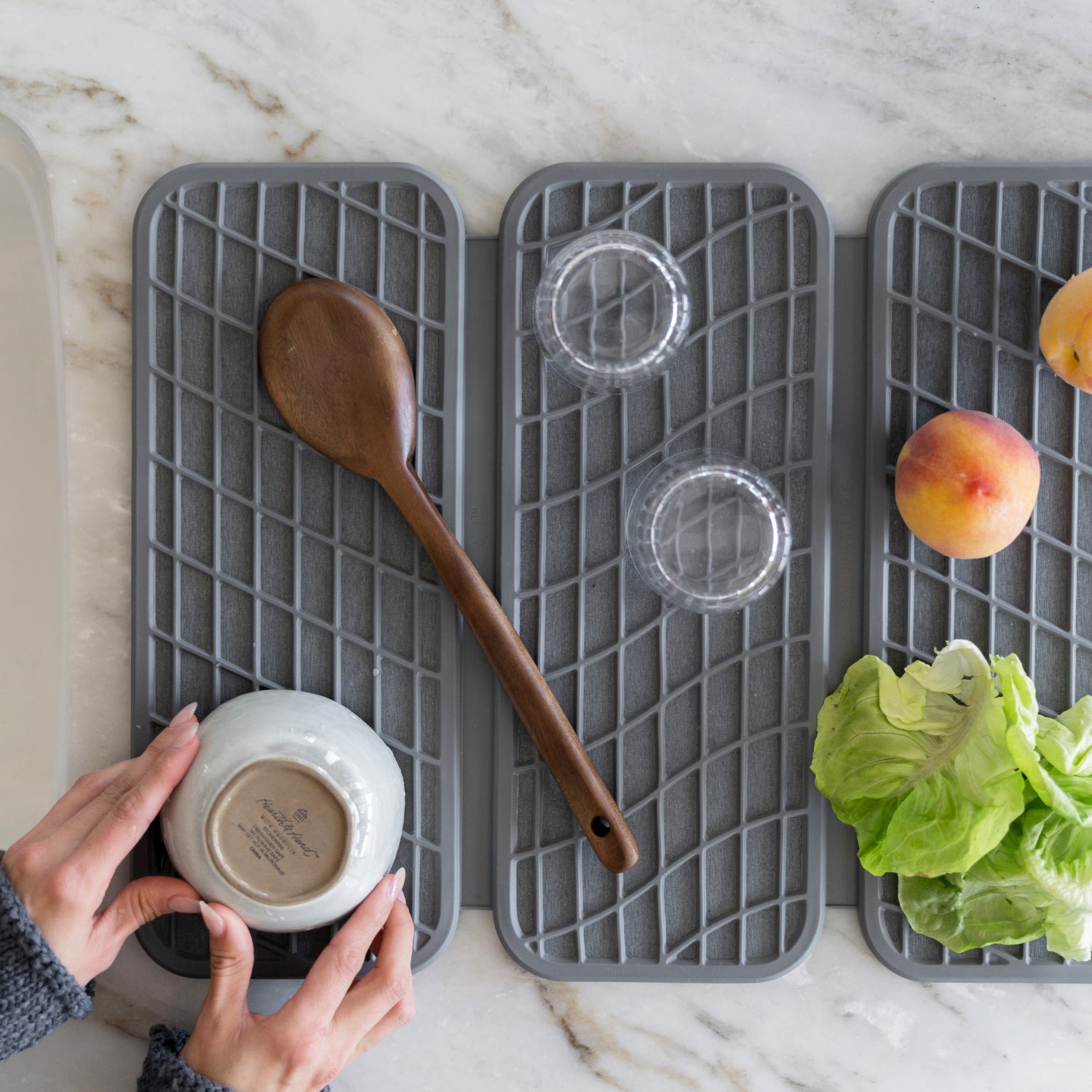 dish drying pad being used for drying dishes