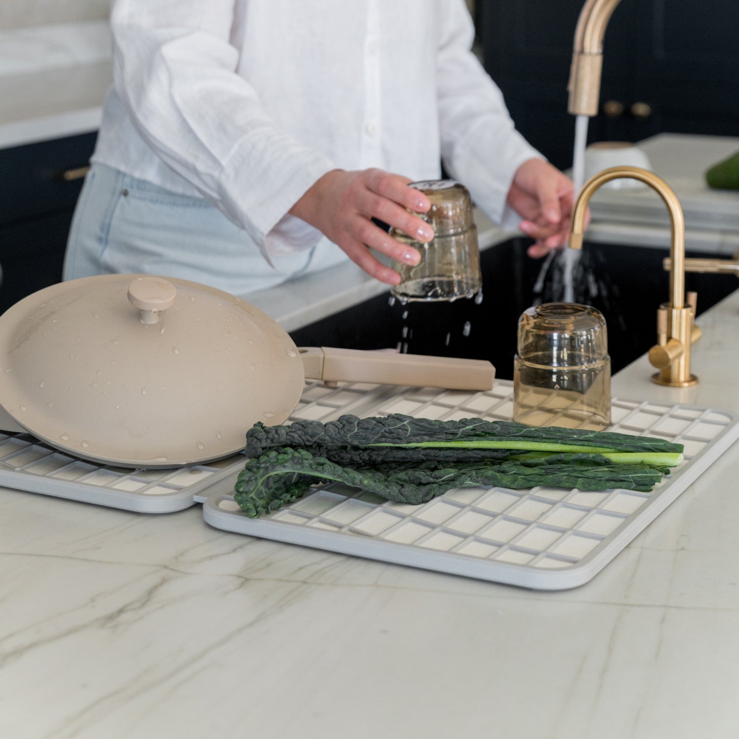 glasses being dried on dish pad