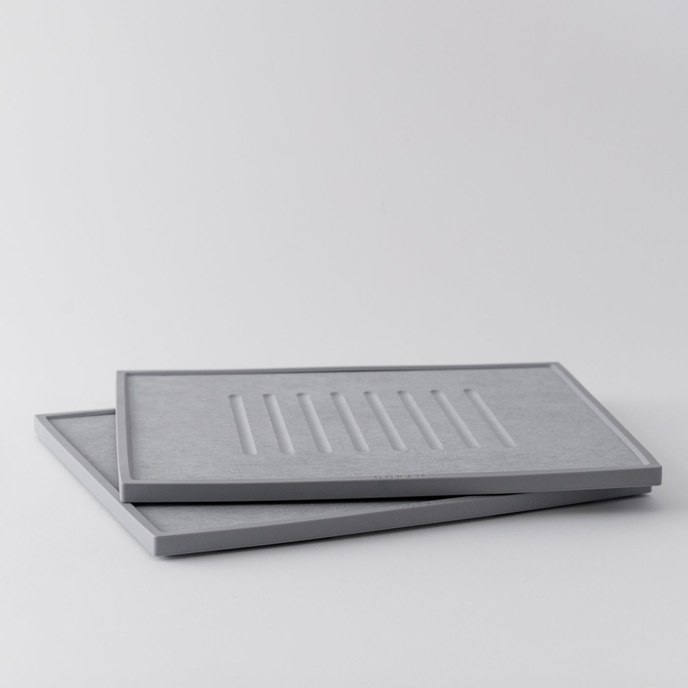 two light grey dish drying stone stacked 