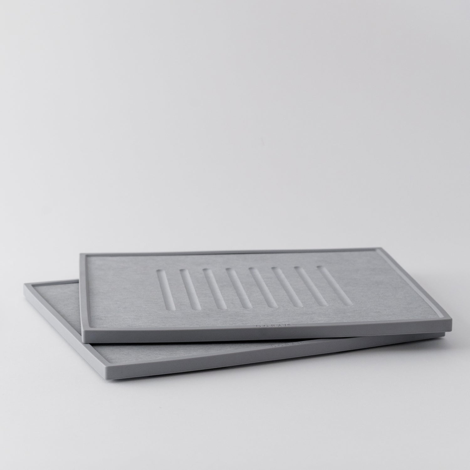 two light grey dish drying stone stacked 