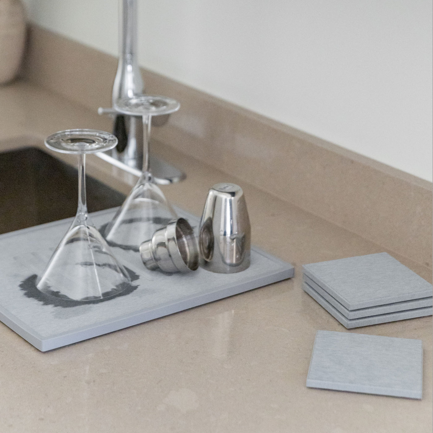 Modern bar set in clean kitchen that's quick-drying. 