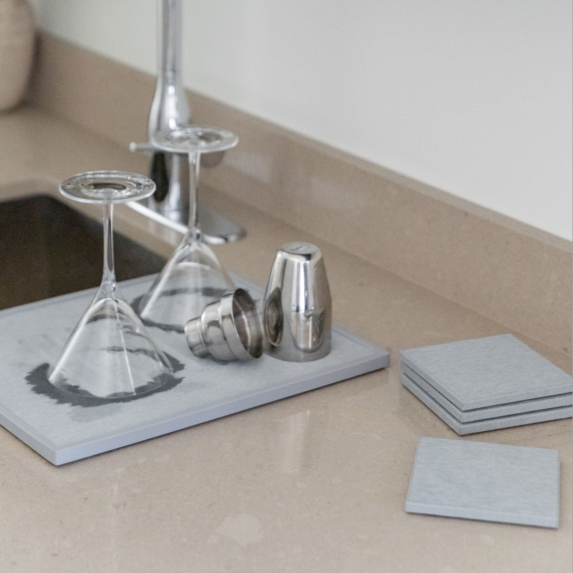 Modern bar set in clean kitchen that's quick-drying. 