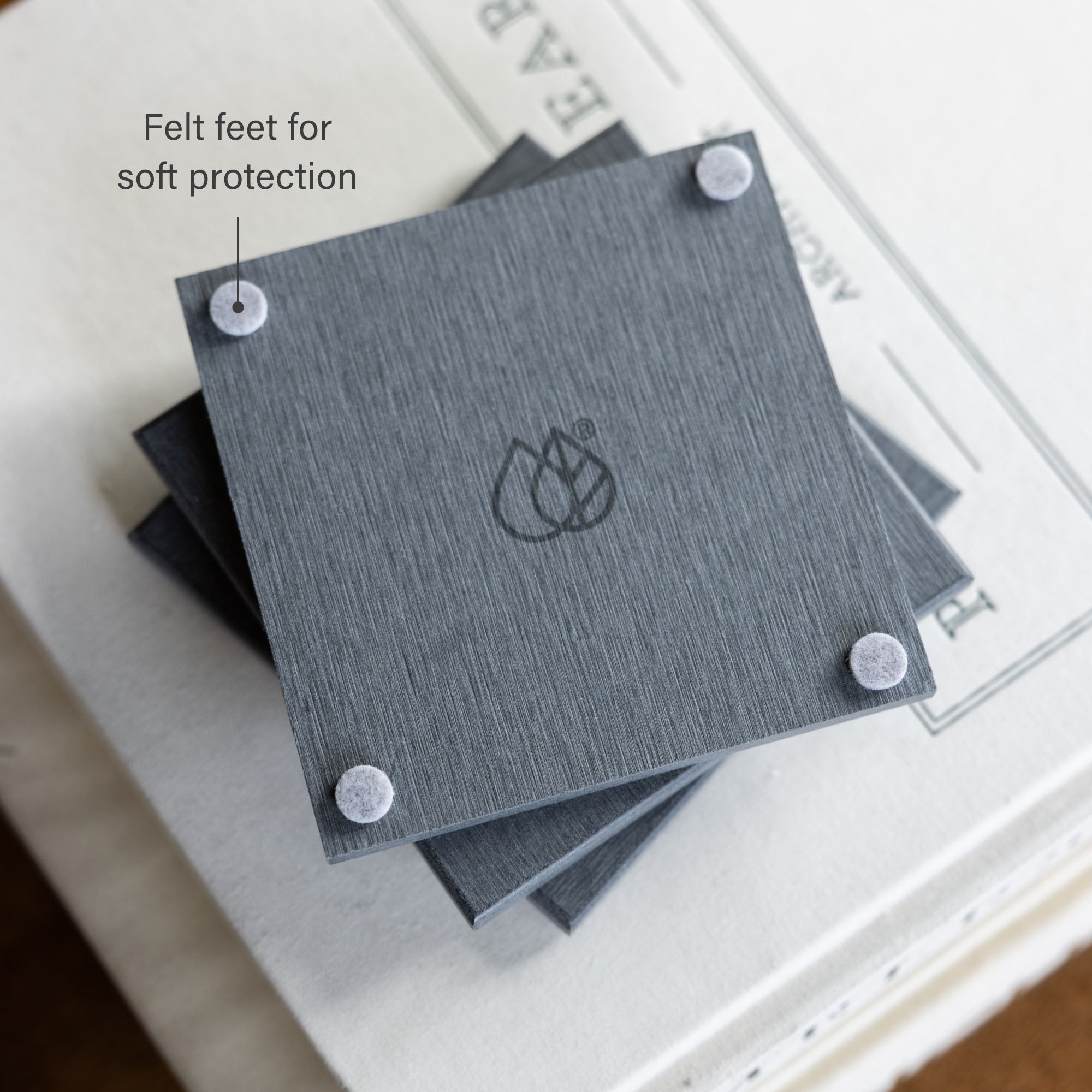 Coasters with felt feet for soft protection on bottom. 