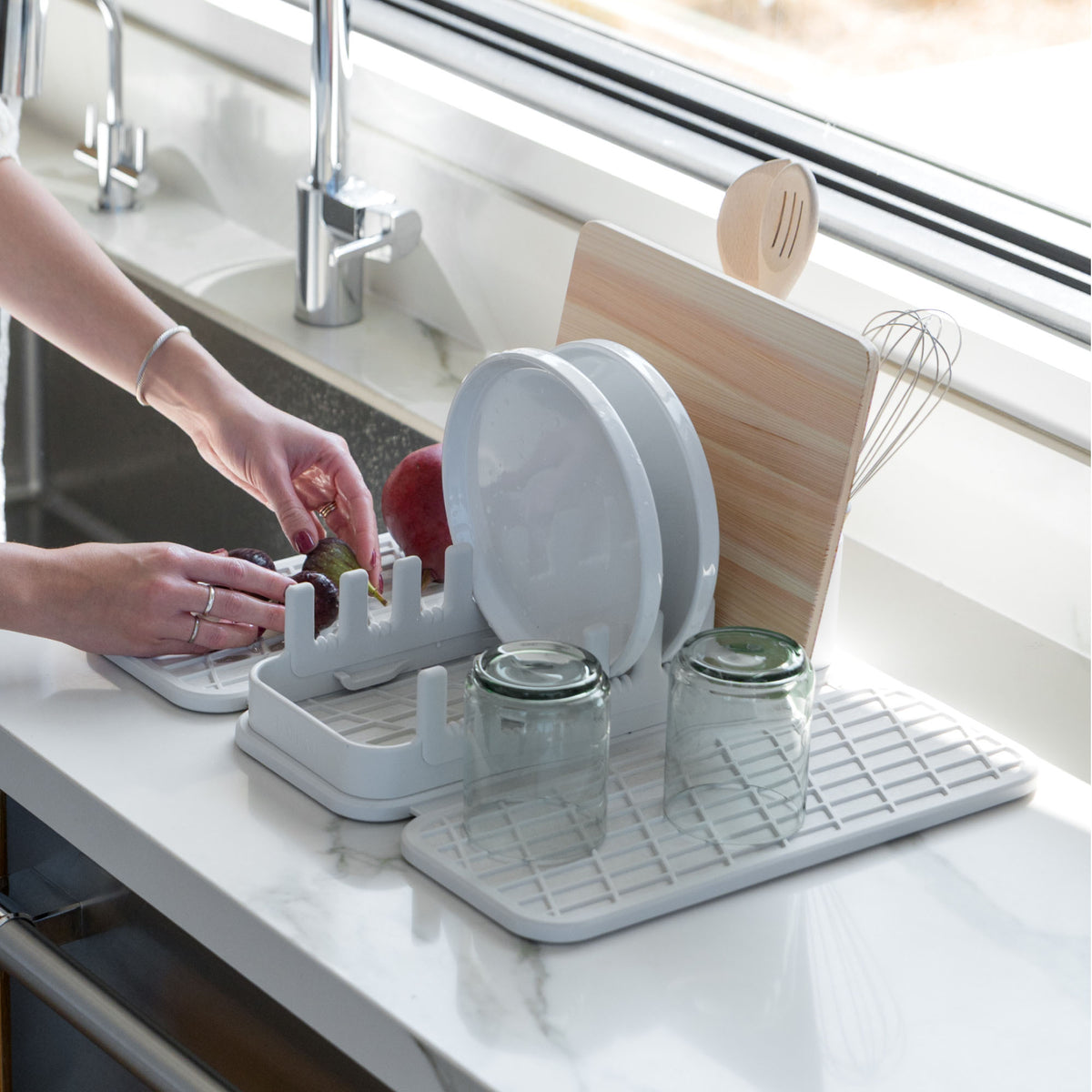 Glacier Dish Pad with Glacier Dish Pad Rack with wet dishes being added. 