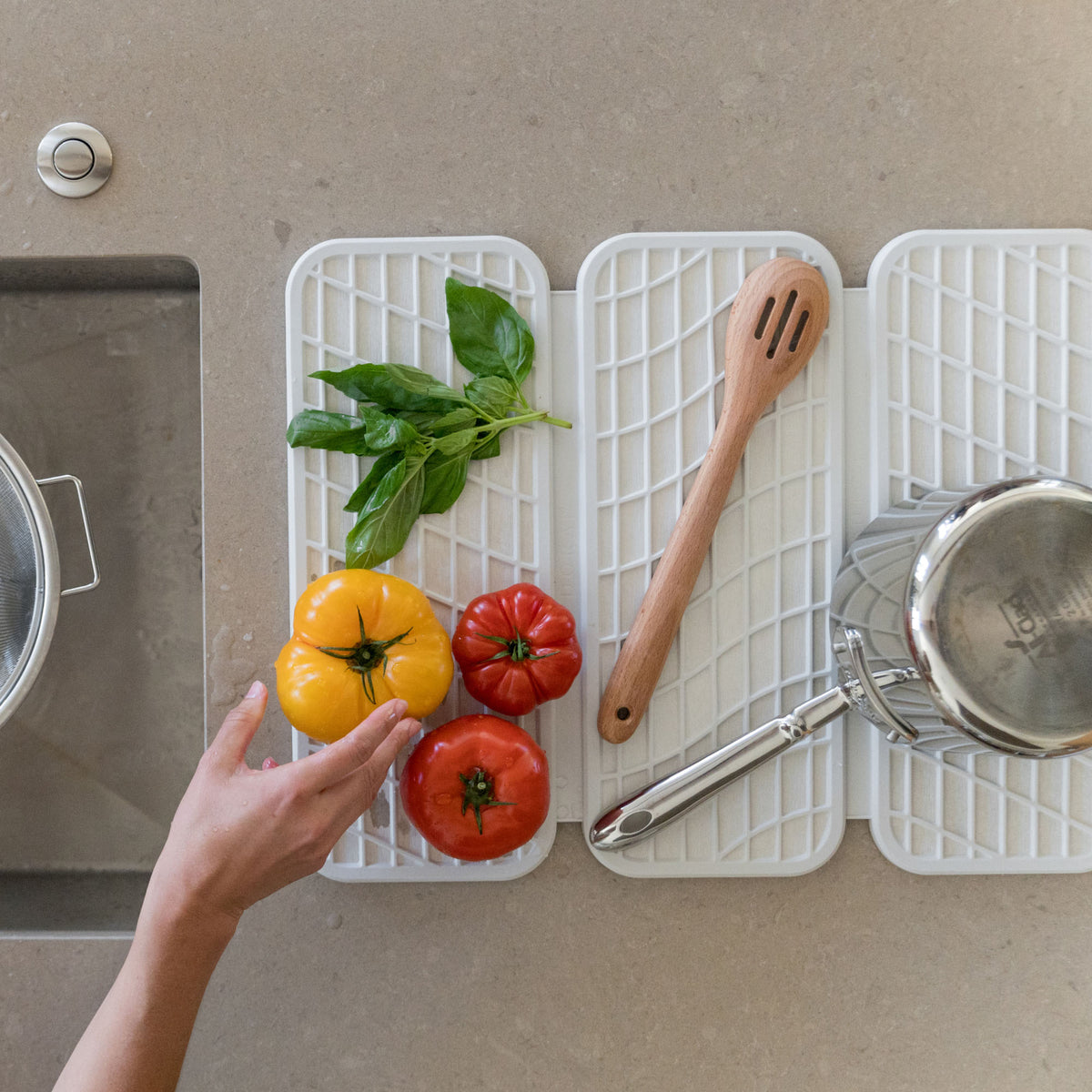 Glacier Dish Pad in clean kitchen with dry dishes. 
