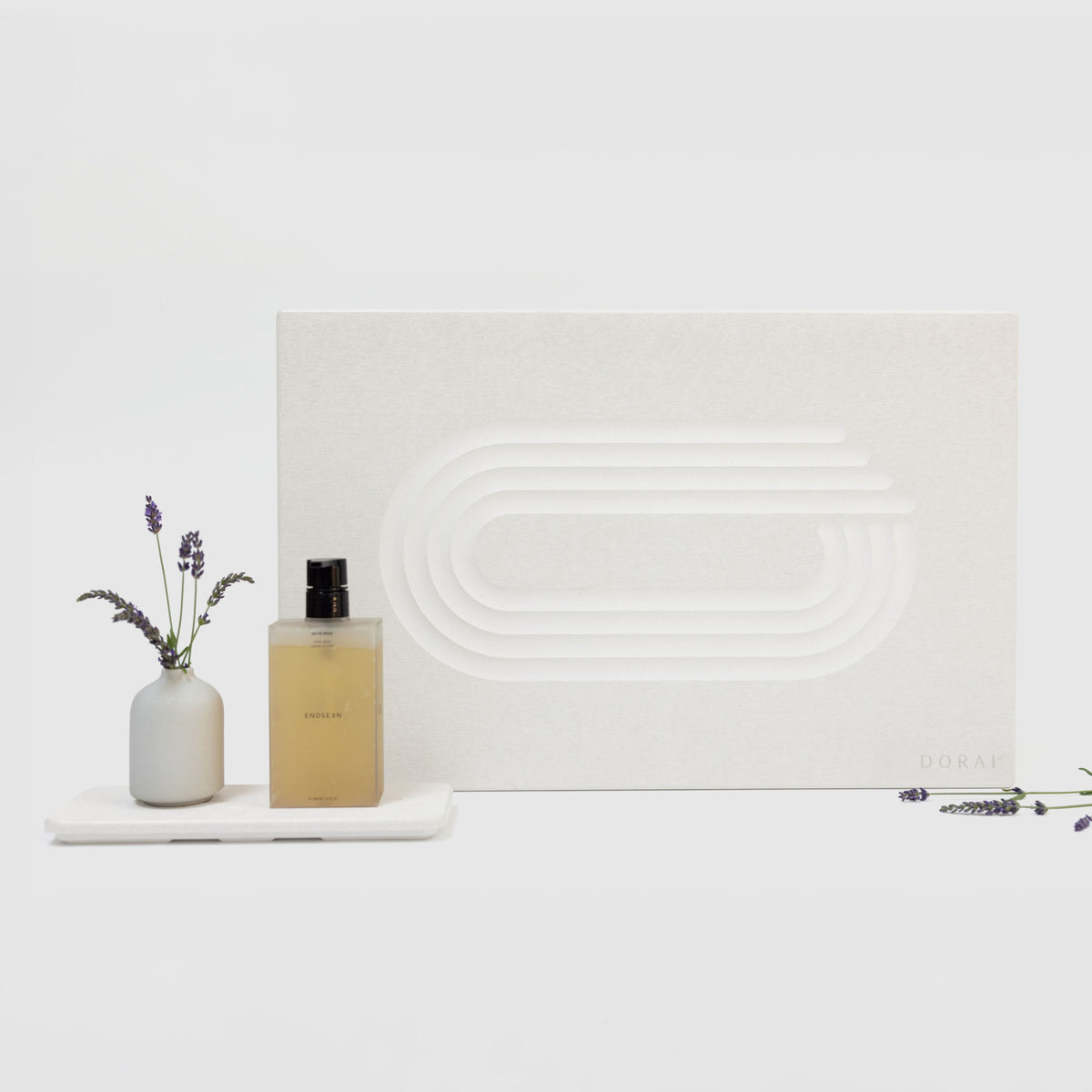 Sandstone Current Bath Stone Mat and Sandstone Stone Sink Caddy on white background. 