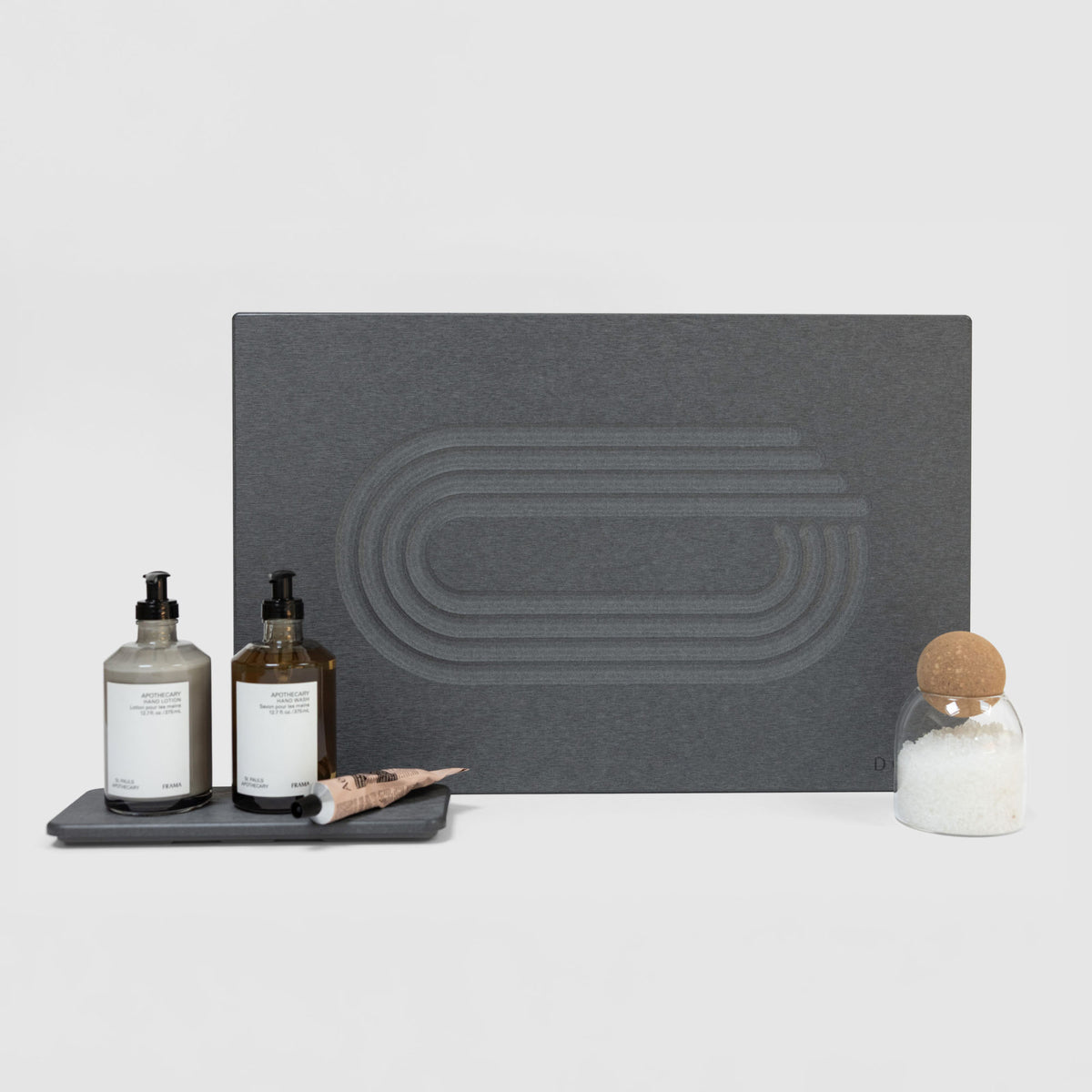 Slate Current Bath Stone Mat and Slate Stone Sink Caddy on white background. 