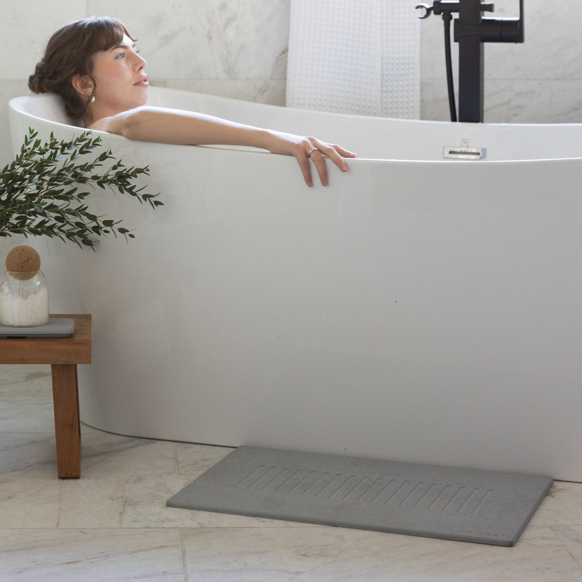 Ash Aspen Aspen bath stone mat outside gorgeous modern bathroom.  