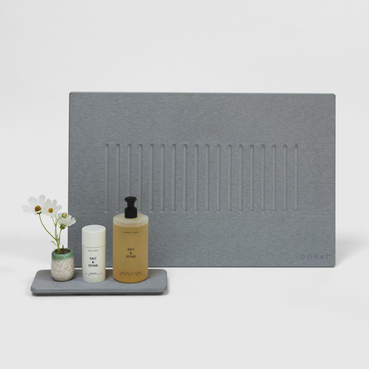 Ash Aspen Bath Stone Mat and Ash Stone Sink Caddy on white background. 