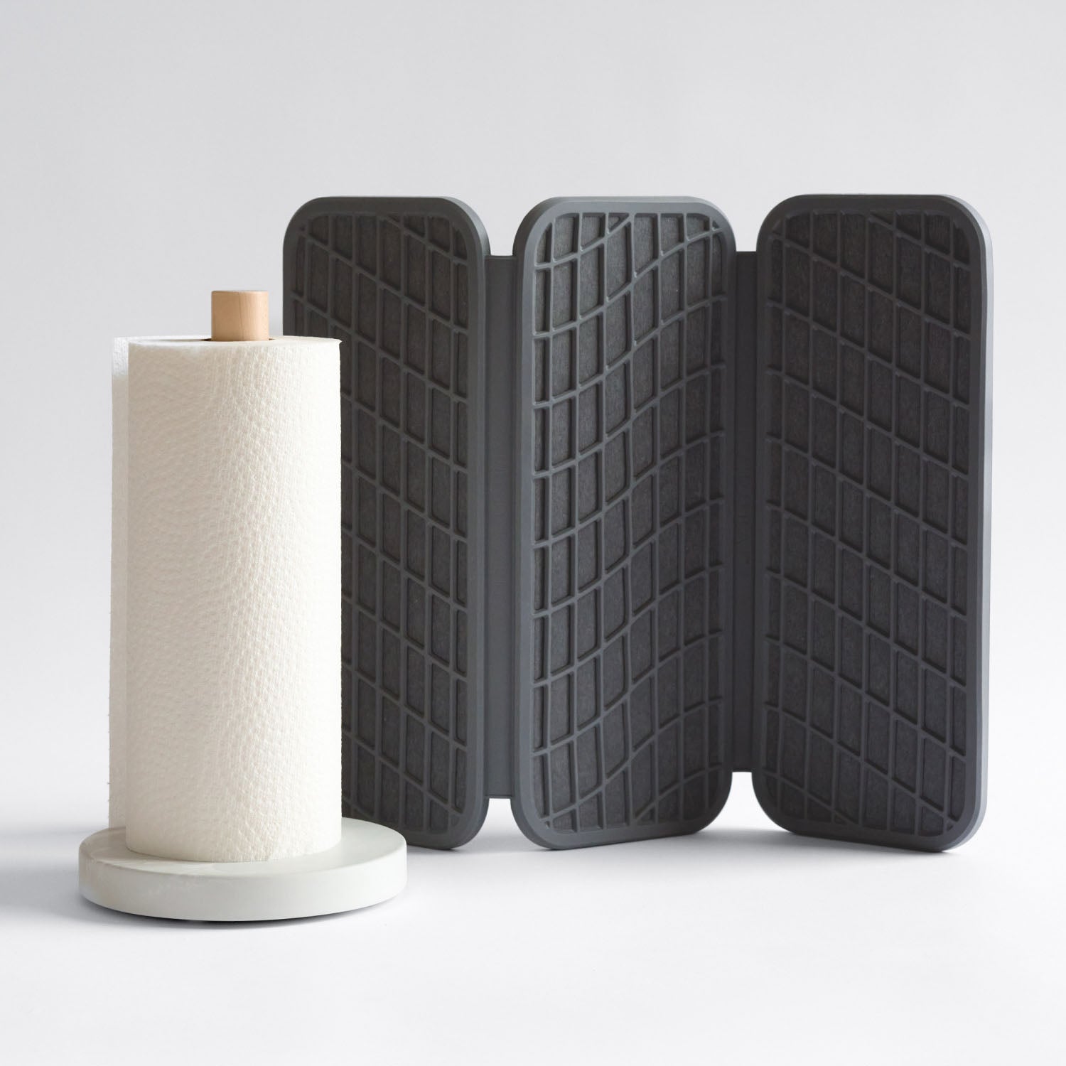 dark grey dish drying mat with paper towel holder as kitchen set