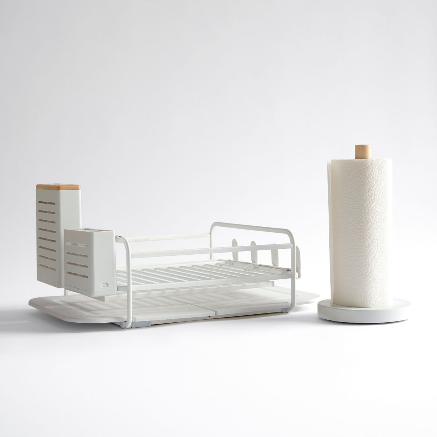 spacious dish rack with paper towel holder as kitchen set