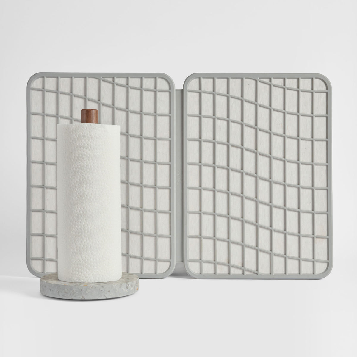 Basalt Paper Towel Holder and Sandstone Large Drift Dish Pad on white background.