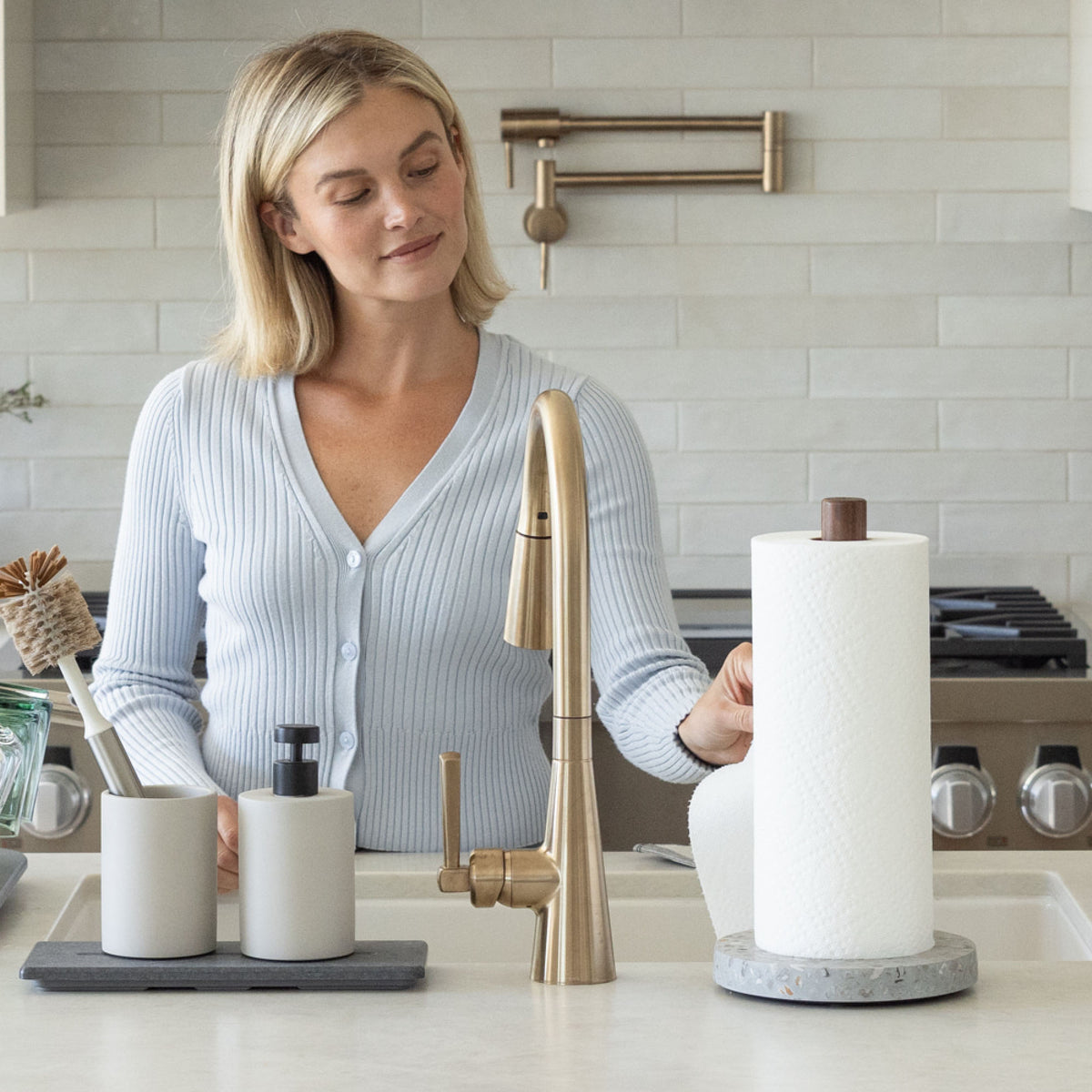 Basalt Paper Towel Holder and Slate Stone Sink Caddy in a beautiful kitchen. 