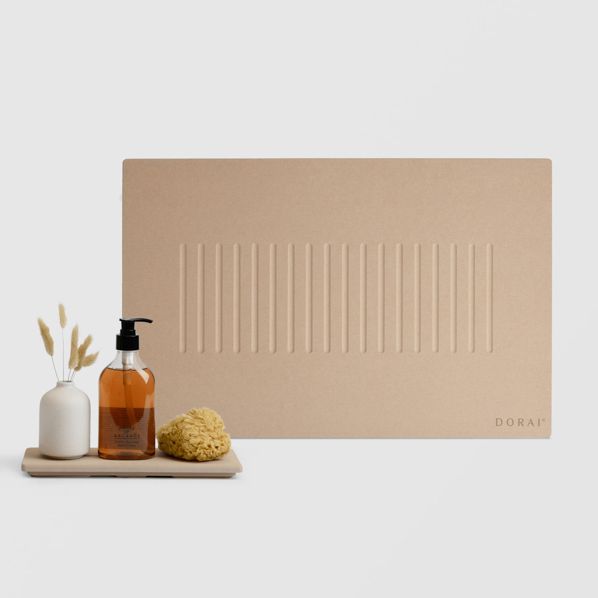 Clay Aspen Bath Stone Mat and Clay Stone Sink Caddy on white background. 